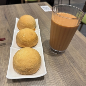 pic of char siew bun and HK milk tea